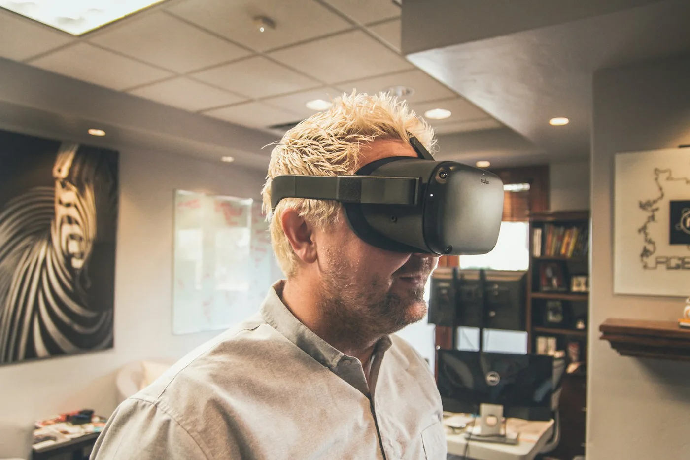 Engineer using immersive VR to review a virtual automotive prototype