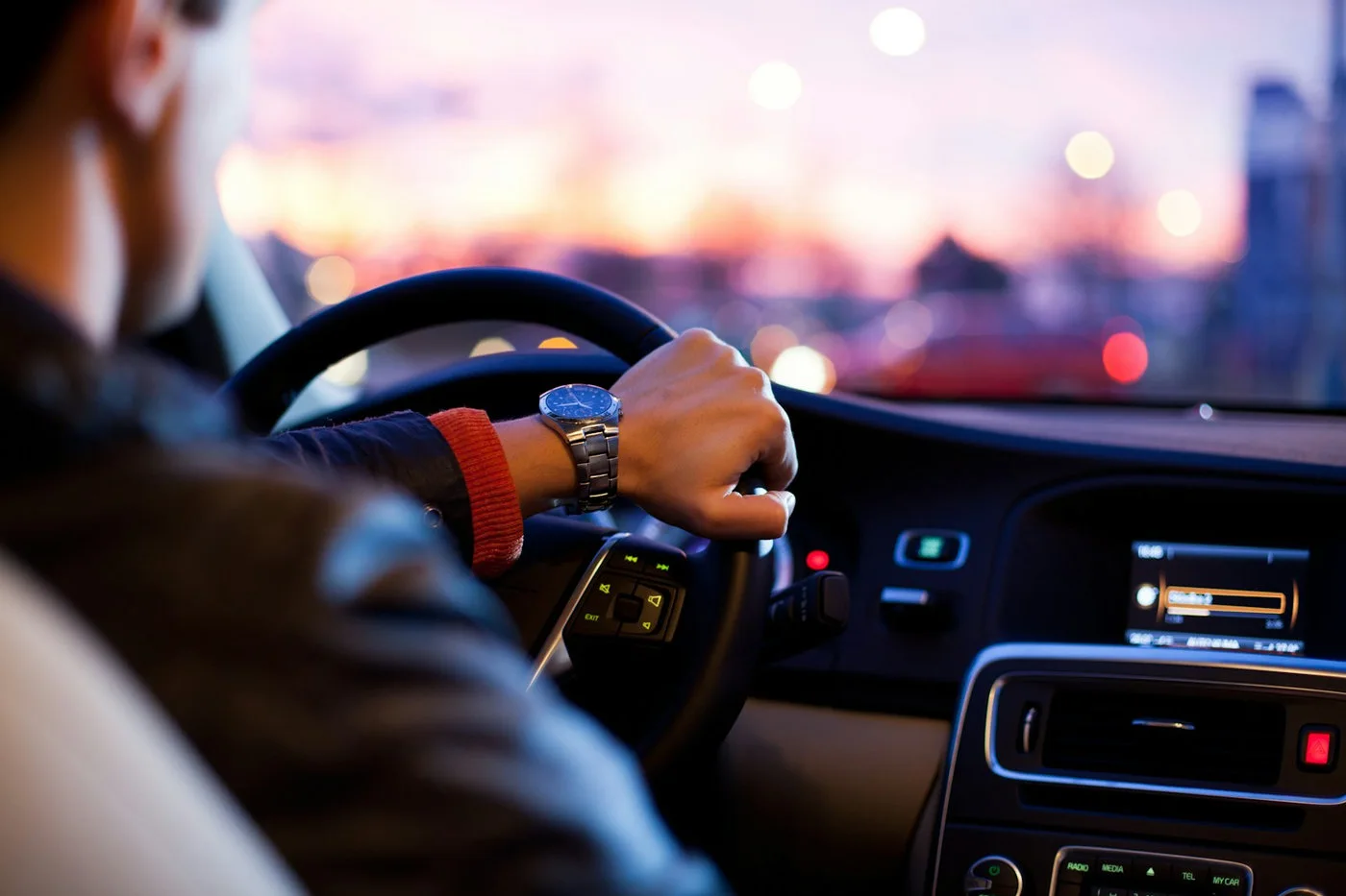 Driver and road illustrating AI-assisted mobility systems