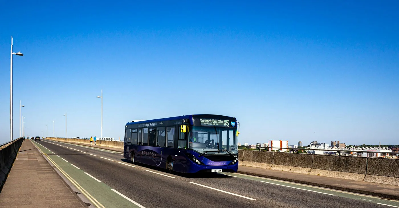 City bus travelling through an urban transport network