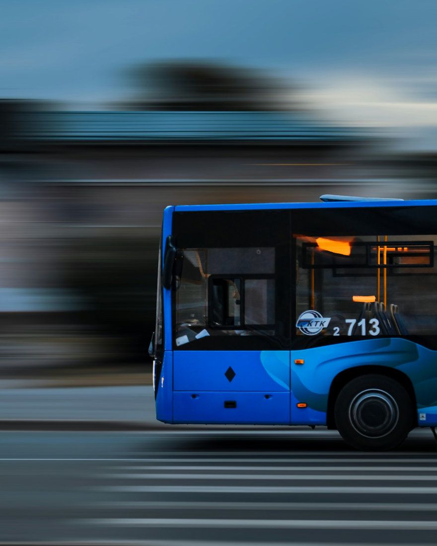 Urban bus operating alongside connected city infrastructure