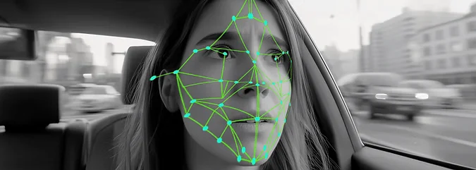 Facial tracking mesh on a passenger’s face
